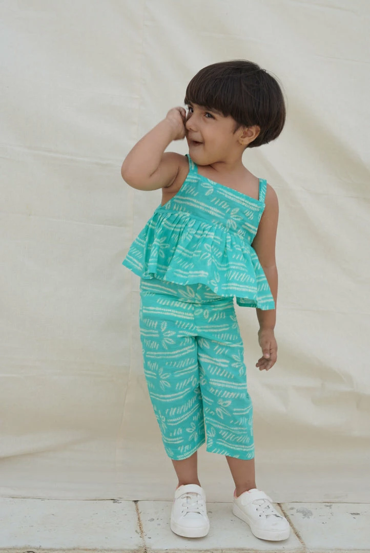 The Wabi Sabi Co Mini Corner Tiffany Peplum Jumpsuit 1 The Wabi Sabi Co Mini Corner Tiffany Peplum Jumpsuit